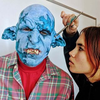 Isamaya Ffrench painting blue monster head for One Otrix Point Never album artwork