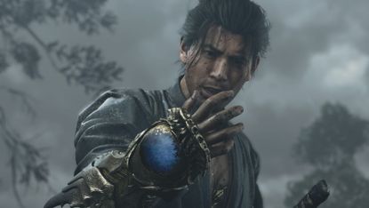 Musashi examines the oni gauntlet with a confused expression in Onimusha: Way of the Sword