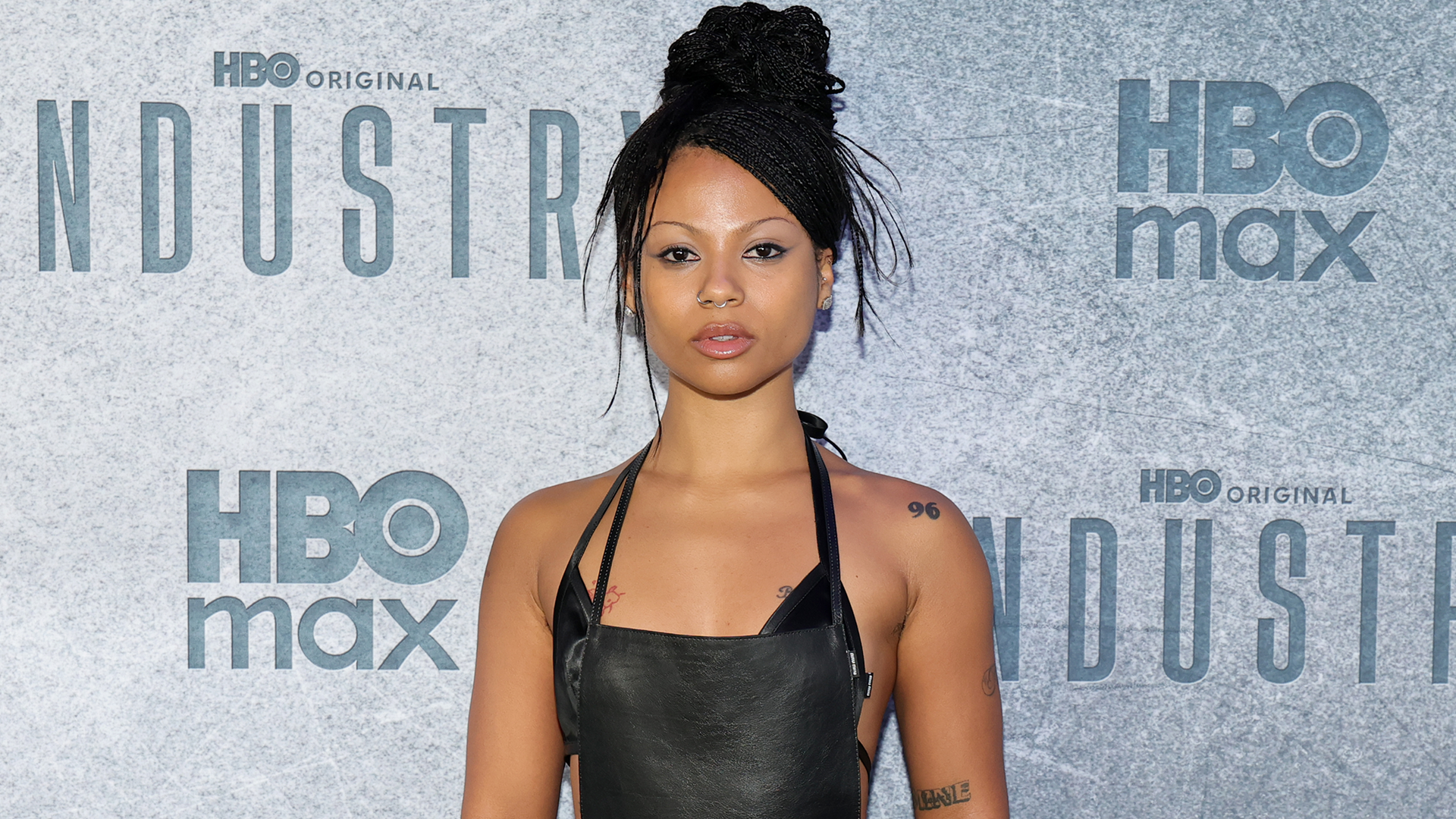 Myha'la attended the Industry Season 3 premiere in a custom leather take on Miu Miu's apron trend