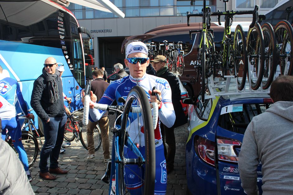Arnaud Demare fights his way through the crowd to get to sign-on