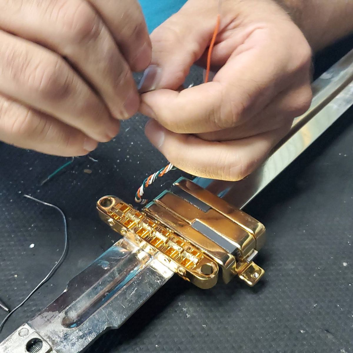 A guitar being built out of a sword