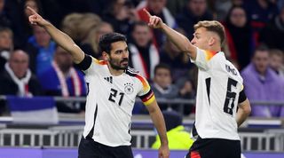 Who is Joshua Kimmich's wife? Germany pair Ilkay Gundogan and Joshua Kimmich during a friendly against France in March 2024.