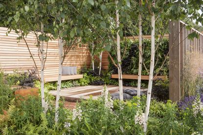 terrace garden ideas with wood slats and built in seating