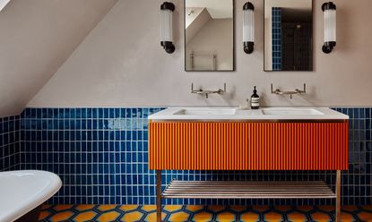 blue and orange bathroom project by Michaelis Boyd