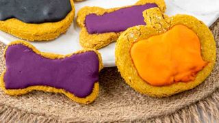 Pumpkin and bone-shaped Halloween dog treats