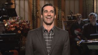 Jon Hamm smiling during his SNL monologue