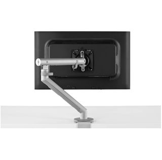 Herman Miller Flo Monitor Arm product image, showing the silver arm affixed onto a desk