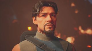 Best Dune: Awakening homeworld, caste, and mentor - A close-up shot of a customised masculine character standing with a backdrop of fire.