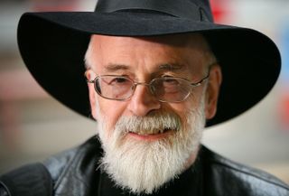 Author Terry Pratchett poses for photographs outside Number 10 Downing Street on November 26, 2008 in London