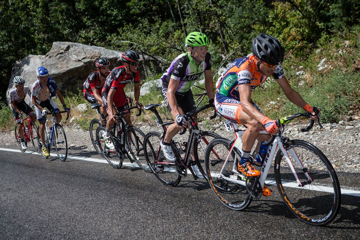 Damiano Cunego (Nippo-Vini Fantini) leads a group up the final climb