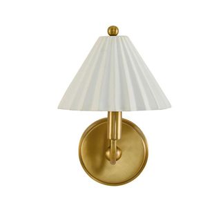 A wall light with fluted shade