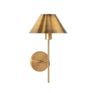 A gold metallic wall sconce with an angular lampshade, a thin handle, and a circular base