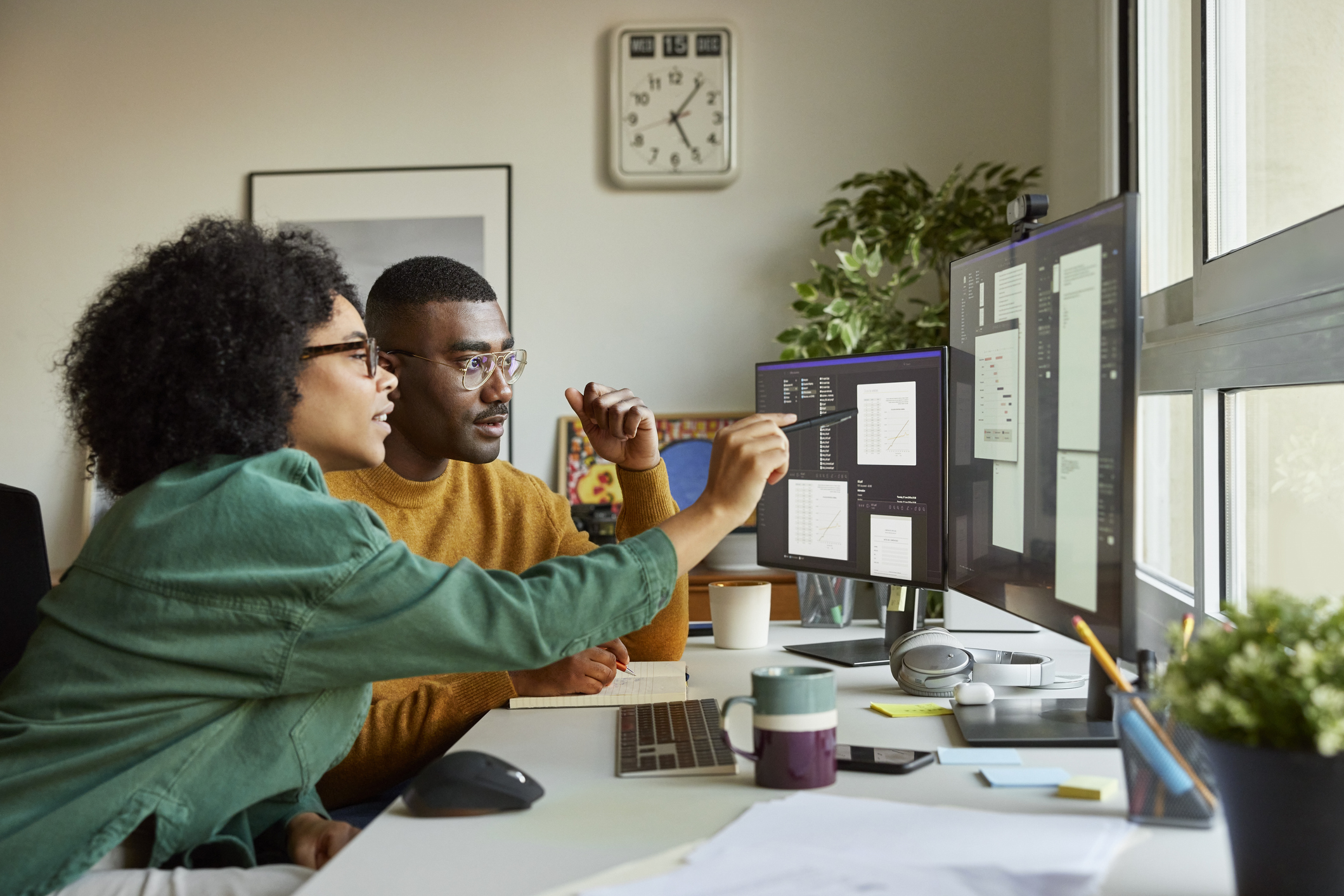 people looking at a computer screen