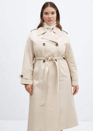 model wears a trench coat 