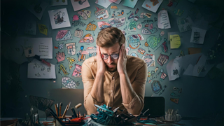 Adobe AI; a man looks stressed surrounded by images