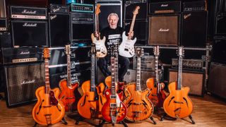 Randy Bachman with a selection of guitars from the ‘Randy Bachman: Every Guitar Tells a Story’ exhibition