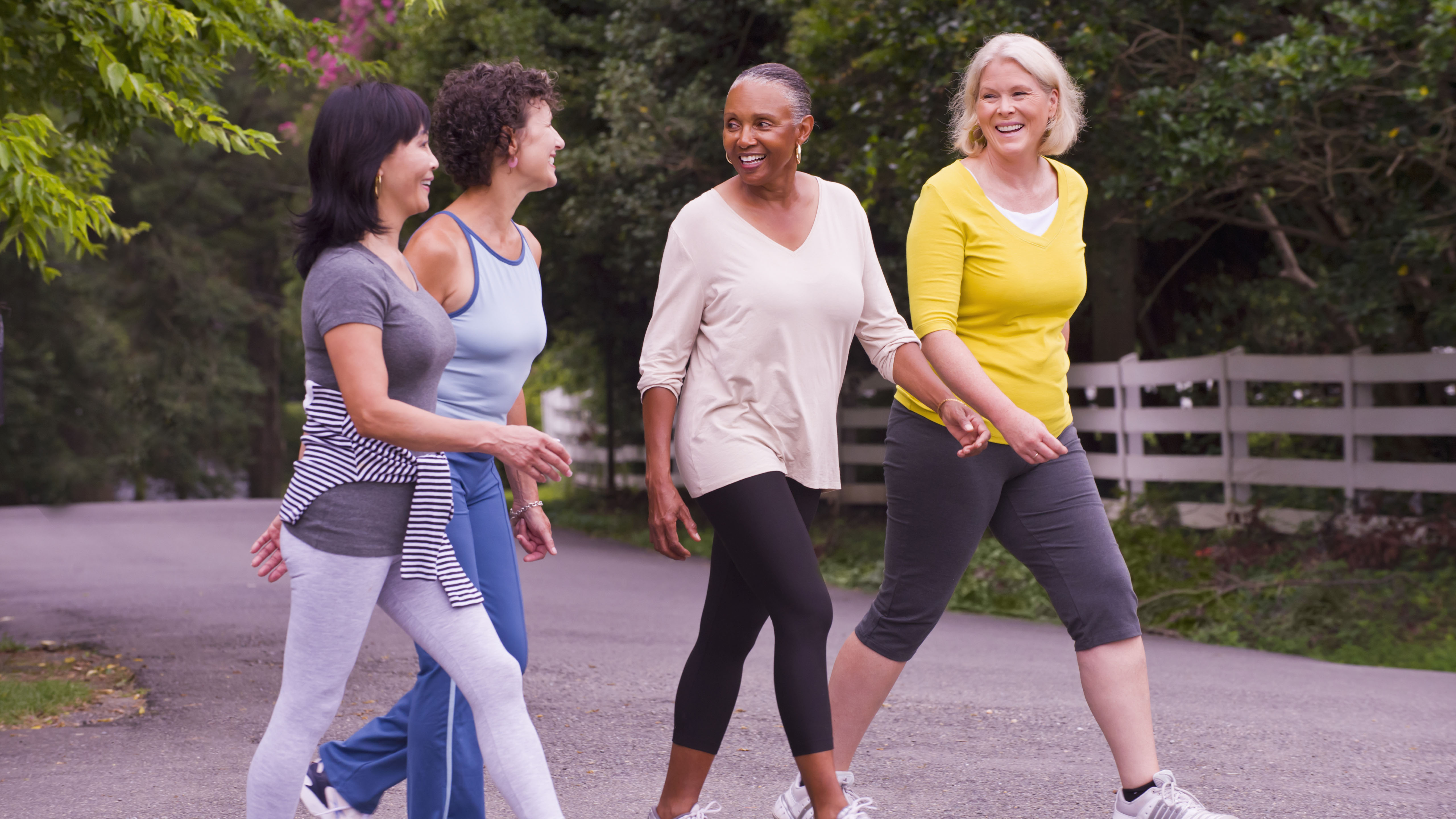 Middle aged women walking together