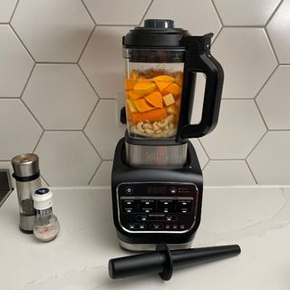 Ninja Foodi HB150UK Blender and Soup Maker jug containing chopped ingredients for butternut soup