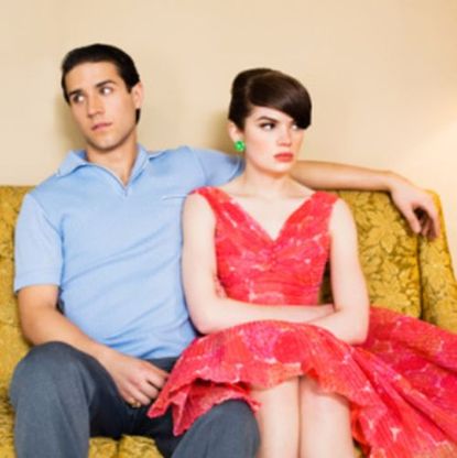man and woman on a couch
