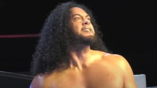 Hikuleo after receiving a chest chop in NJPW