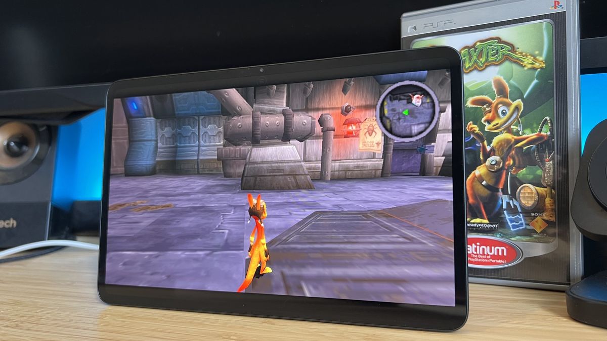 RedMagic Astra 2 gaming tablet running Daxter with the PSP case in the background