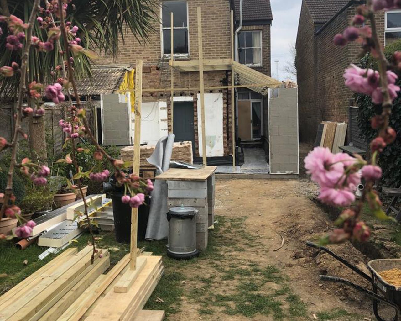 before shot of a garden halfway through an extension