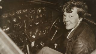 Amelia Earhart pictured in the cockpit of the Lockheed Electra in 1937.