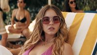 Cassie watching Maddy at the pool in Euphoria Season 3. 