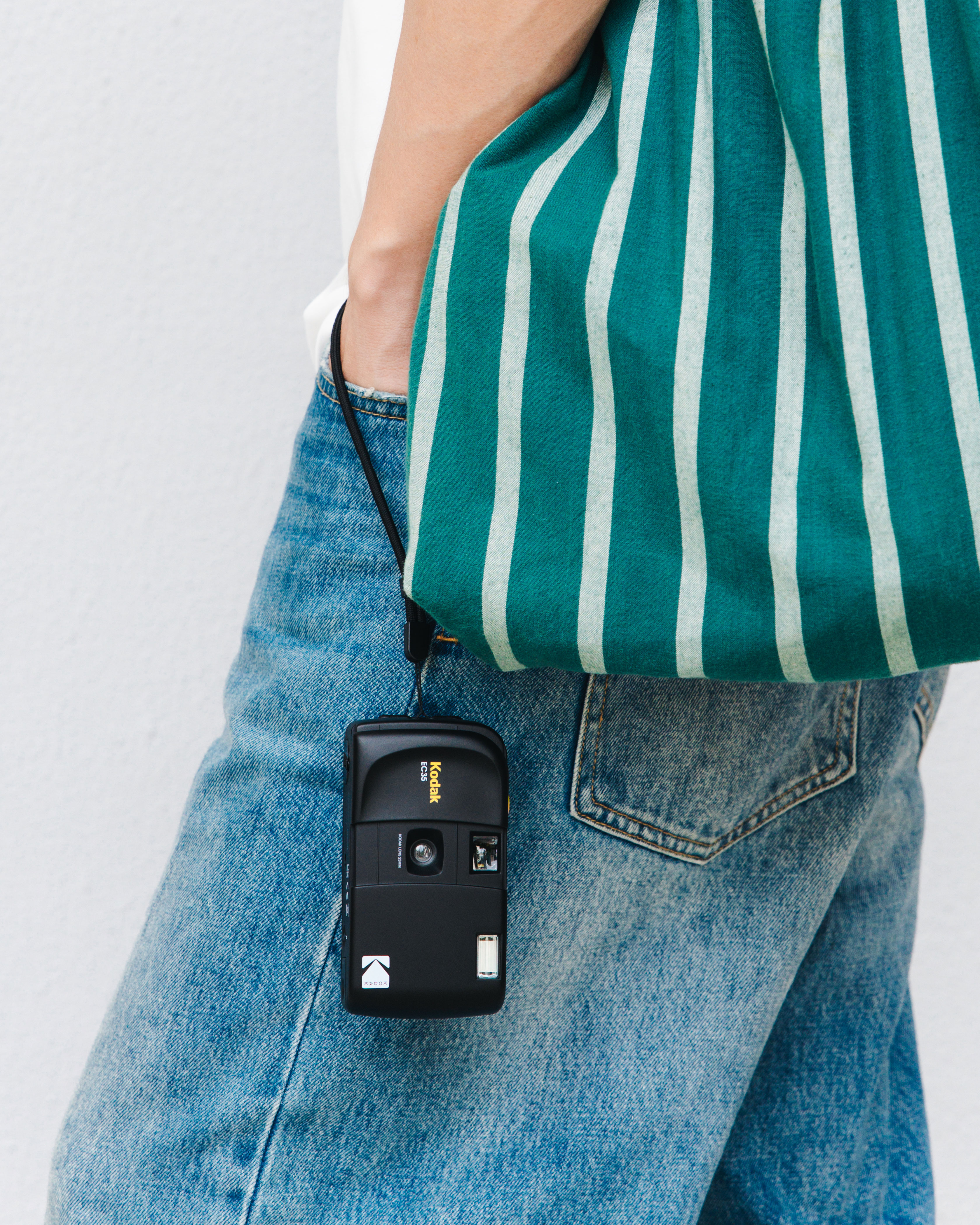 The Kodak EC35 compact film camera hanging from a wrist