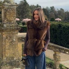 Emma Rose Leger in a faux fur vest at Estelle Manor