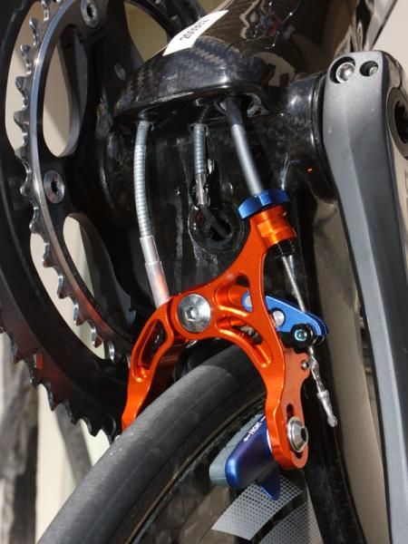 The Trinity Advanced SL requires a proprietary rear brake caliper as the cable pull arm is moved to the other side of the mounting stud. Giant claims the front derailleur still works well despite the tight cable routing.