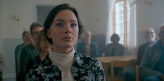 Rebecka in church in episode 4 of The Are Murders