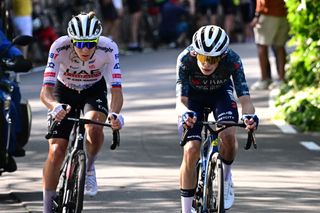 BOLOGNA ITALY JUNE 30 LR Tadej Pogacar of Slovenia and UAE Team Emirates and Jonas Vingegaard Hansen of Denmark and Team Visma Lease a Bike attack in the chase group during the 111th Tour de France 2024 Stage 2 a 1992km stage from Cesenatico to Bologna UCIWT on June 30 2024 in Bologna Italy Photo by Bernard Papon PoolGetty Images