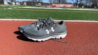 a photo of the Under Armour Charged Gemini running shoe from the side