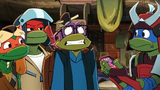 All four Turtles wearing costumes in Tales of the Teenage Mutant Ninja Turtles