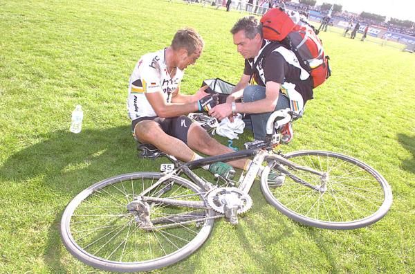 Even those who finish the race need help - John Degenkolb examines the effects the cobbles had on his hands.