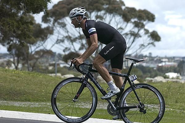 Kristian House (Rapha Condor) from Great Britian out of the saddle in Geelong's Eastern Gardens.