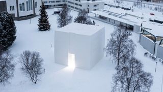 Cube building made of snow – Polestar Snow Space, Finland