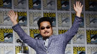 SAN DIEGO, CALIFORNIA - JULY 21: Katsuhiro Harada waves to the crowd at the Tekken 8: The Art of Fighting panel at 2023 Comic-Con International: San Diego at San Diego Convention Center on July 21, 2023 in San Diego, California