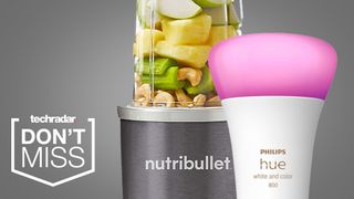A Nutribullet and Philips Hue lightbulb on a grey background
