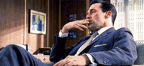 Don Draper smoking a cigarette