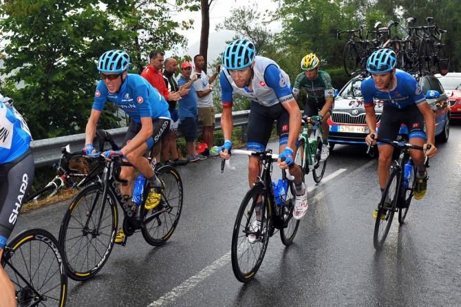 Ryder Hesjedal (Garmin-Sharp) alongside teammates Dan Martin