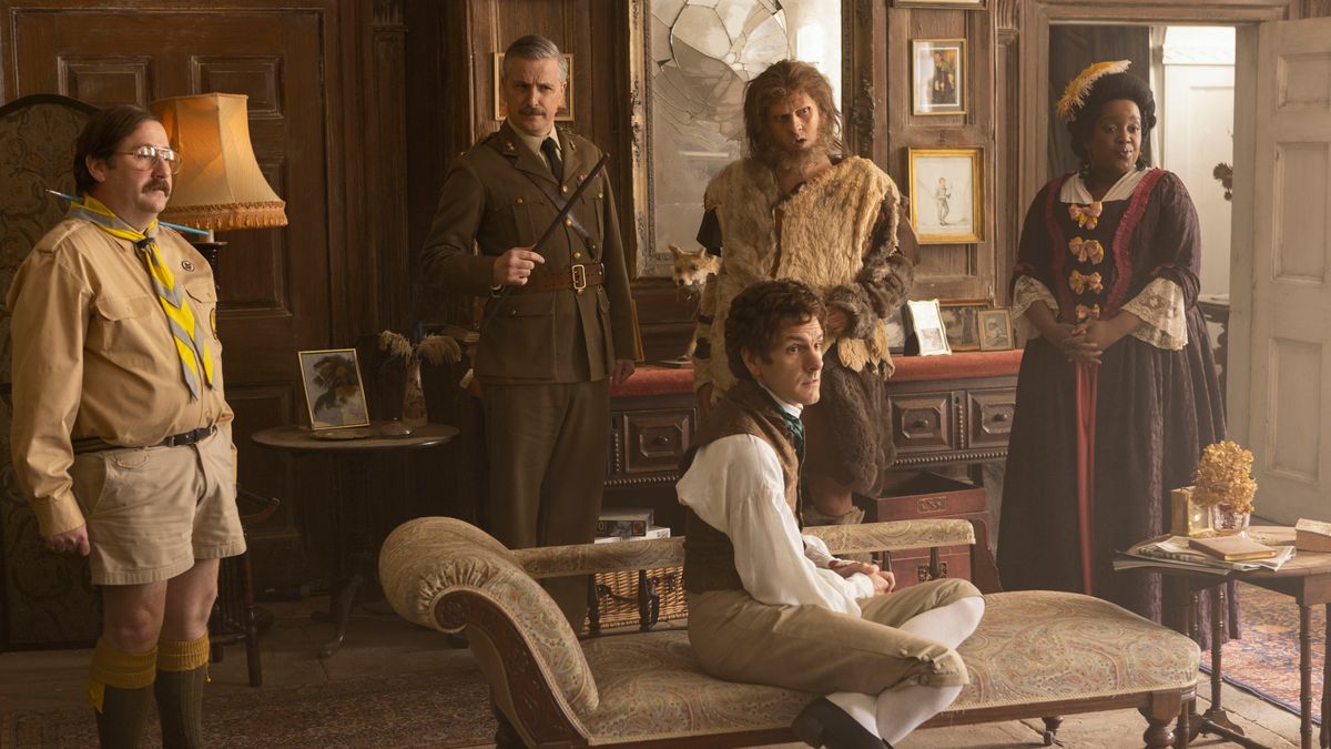 Thomas (Mathew Baynton) sitting on a chaise longue in Ghosts season 5 