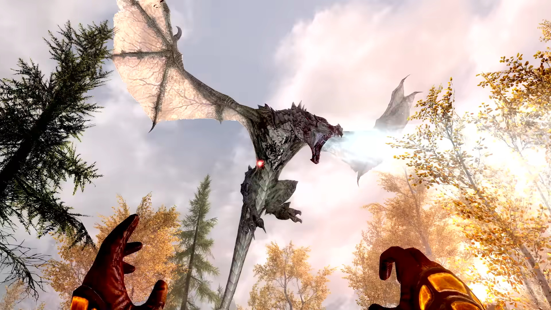 A dragon lying through the air and breaking an ice attack during the RPG The Elder Scrolls 5: Skyrim.