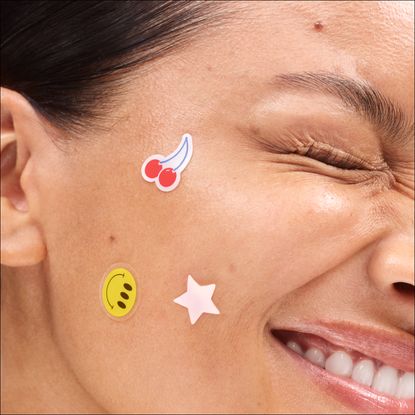 women wearing festive pimple patches