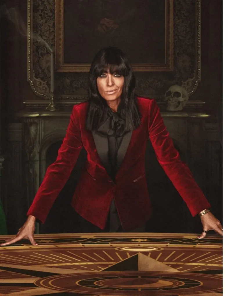 Claudia Winkleman wearing red blazer Traitors