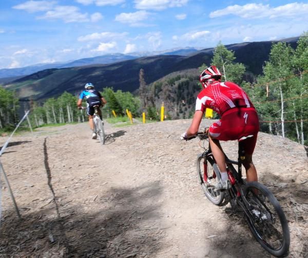 Todd Wells chasing JHK on a long, fast descent.