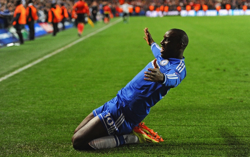Demba Ba knee slides in celebration after scoring for Chelsea against PSG