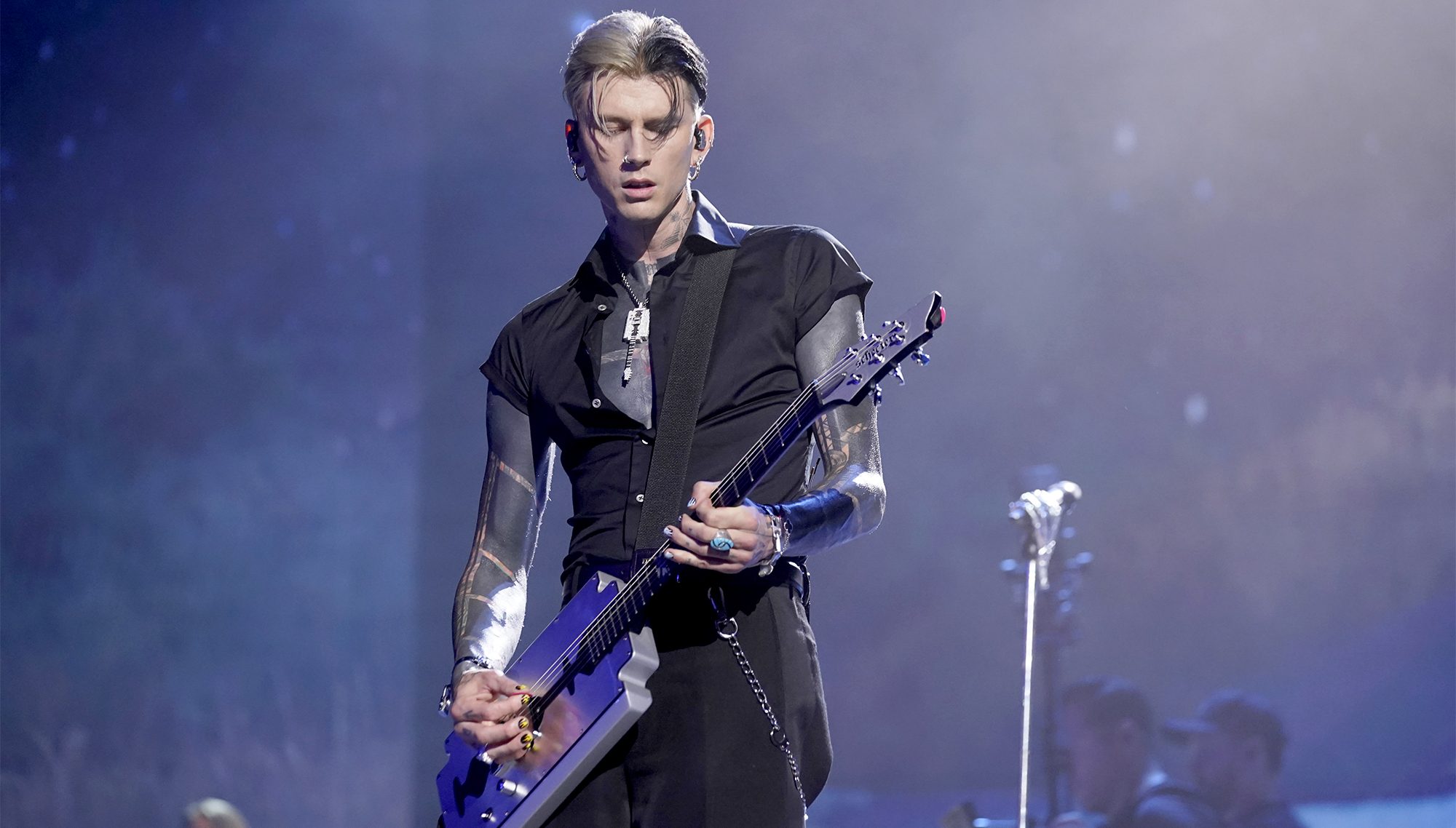 Machine Gun Kelly performs onstage during the 2024 People's Choice Country Awards at Grand Ole Opry House on September 26, 2024 in Nashville, Tennessee.
