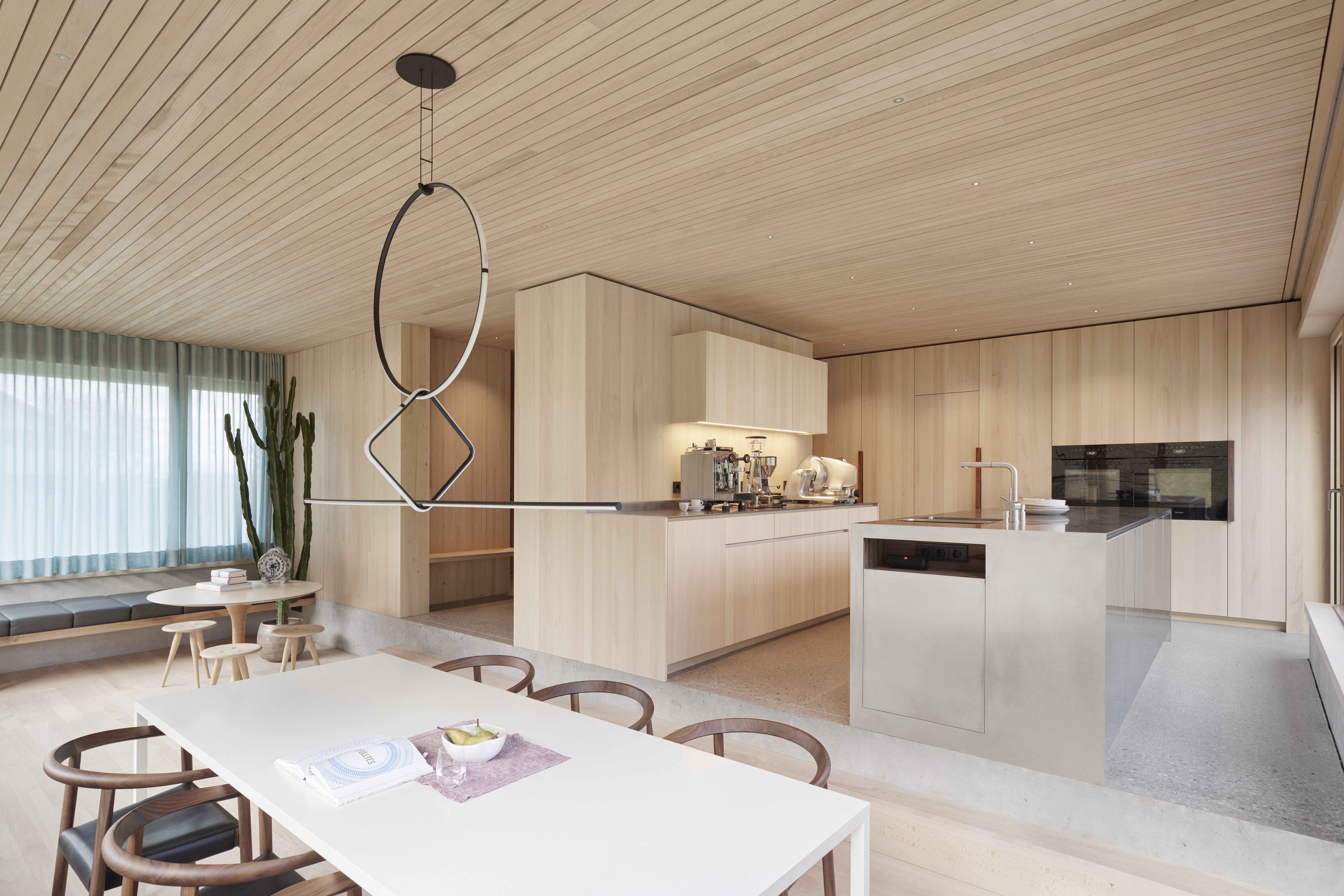 main open plan living space at Haus im Obstgarten timber tower house